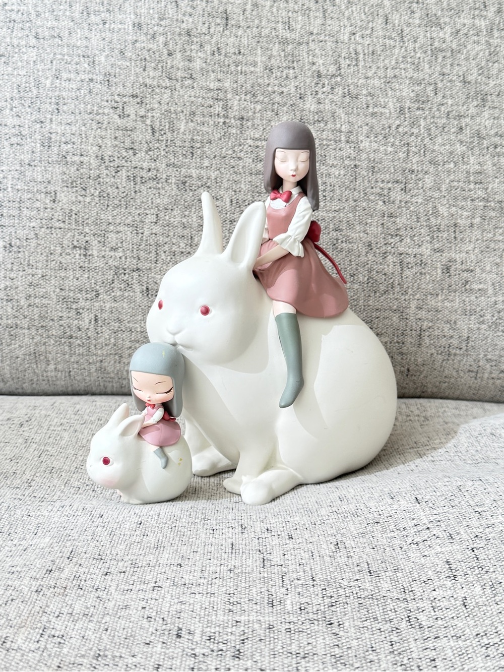 White Ceramic Bunny Figurine with Pink-Dressed Girls